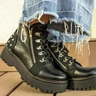 Botín Bolivia cuero negro poroso c/cordones y tachas